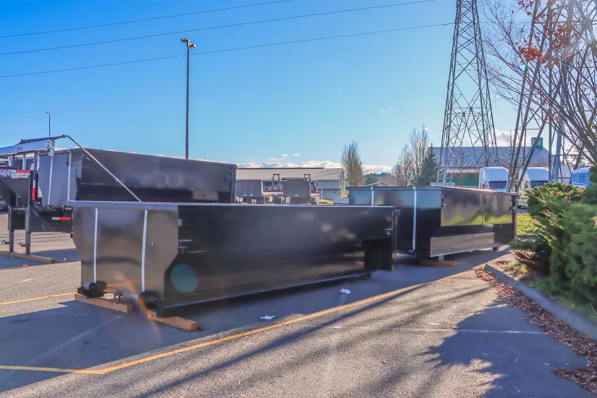 Roll-off dumpster ready for waste disposal at job site for 4 Yard Dumpster Rental in Madison